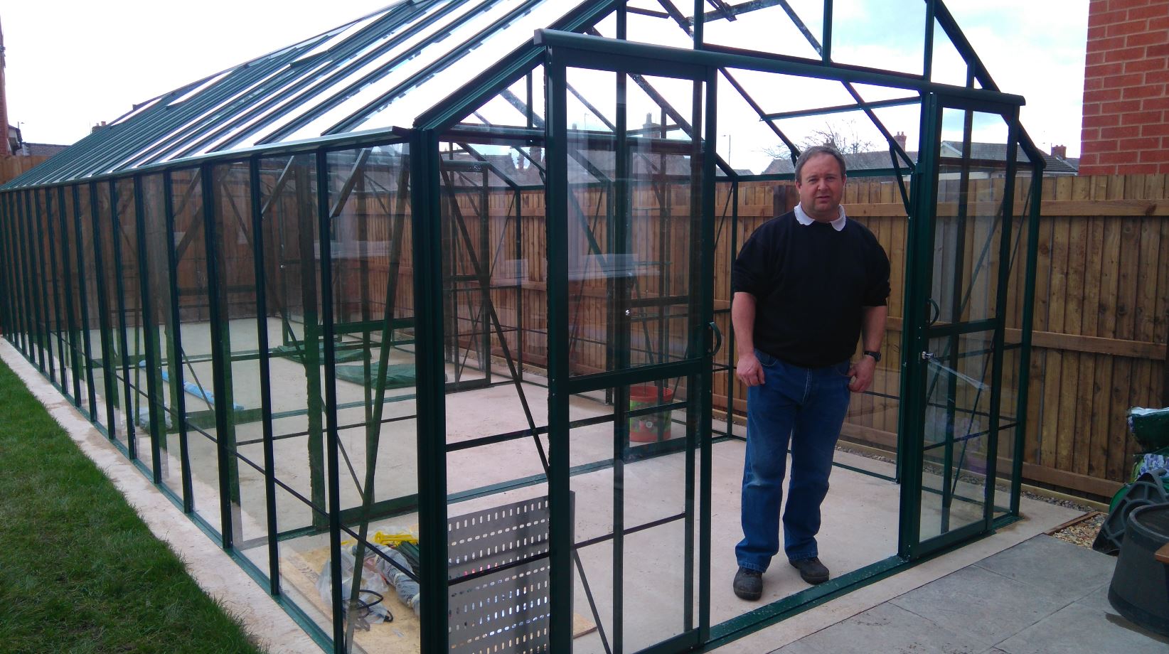 Tim Bales, Hotbox Heaters customer, and his greenhouse using greenhouse heaters